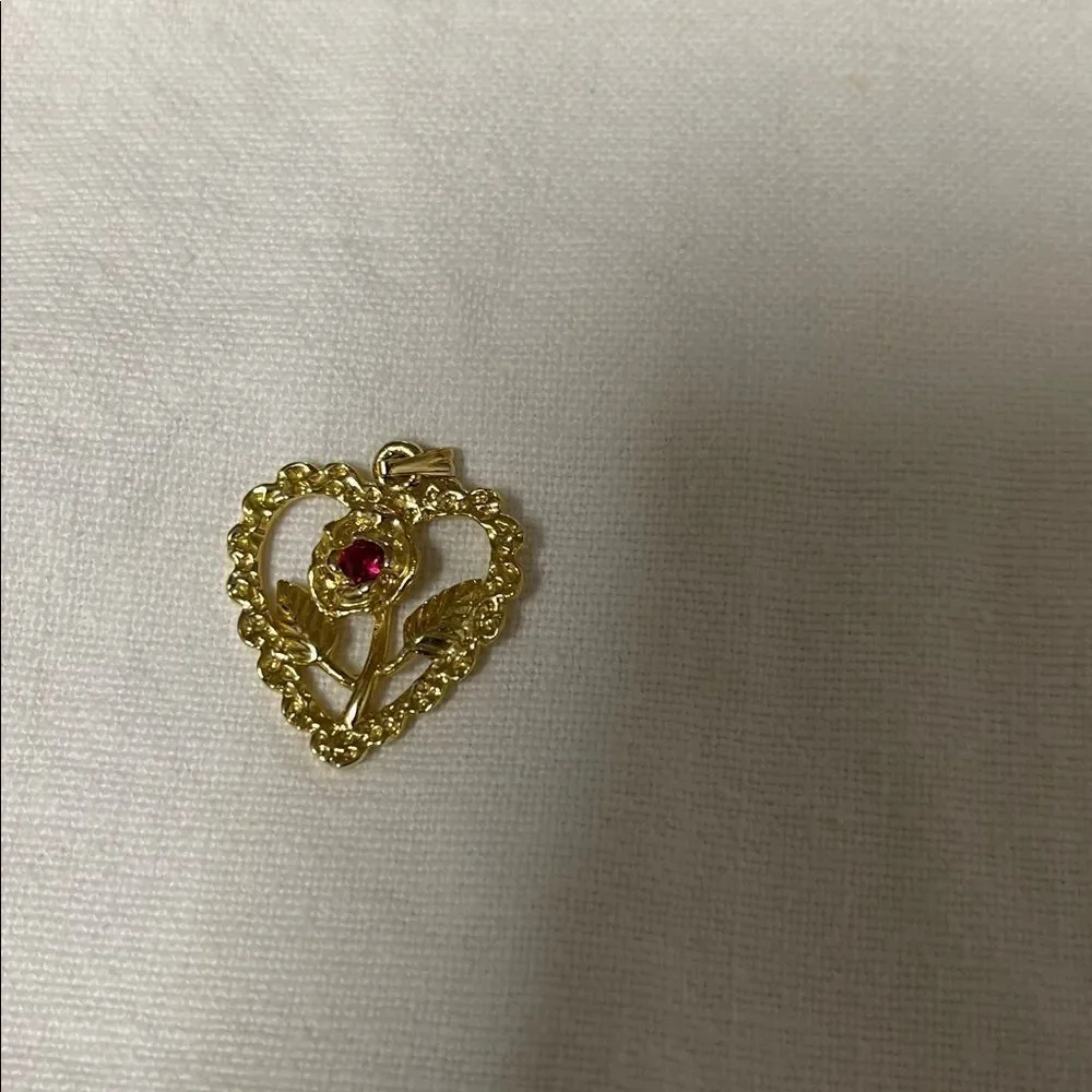 Gold Tone Heart Pendant with Red Gemstone